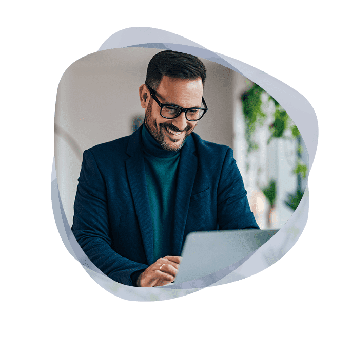 Business manager exploring cyber security services on his laptop
